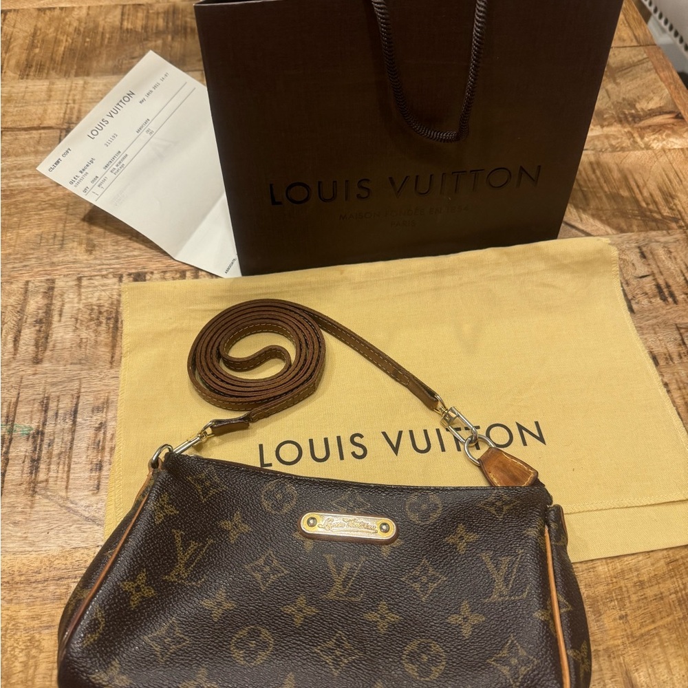 Louis Vuitton Eva Crossbody LV shopping bag and receipt provided. Leather strap